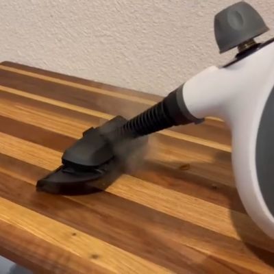 EcoPure steam cleaner sanitizing wooden children's play table